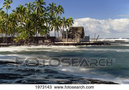 Stock Image - Hawaii, Big Island, Pu'uhonua O Honaunau, Honaunau Bay And Hale O Keawe Heiau. Fotosearch