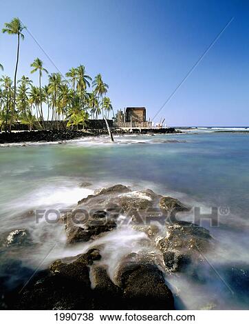 Stock Photo - Hawaii, Big Island, Pu'uhonua O Honaunau, Honaunau Bay And Hale O Keawe Heiau. Fotosearch
