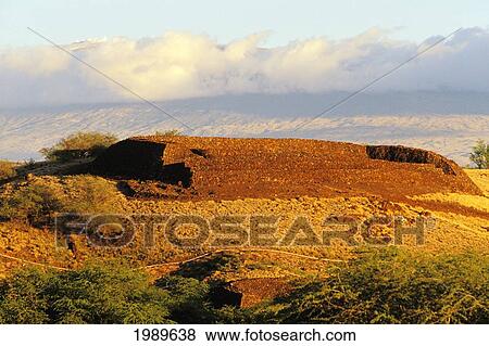 Stock Photo - Hawaii, Big Island, Puukohola Heiau National Historical Site, Snow-Capped Mauna Kea.. Fotosearch