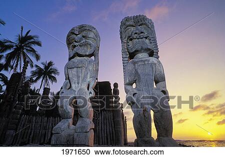 Hawaii, Big Island, South Kona, Pu'uhonua O Honaunau National Historial Park, Carved Wooden Ki'i At Hale O Keawe Heiau, Sunset. View Large Photo Image Stock Image - Hawaii, Big Island, South Kona, Pu'uhonua O Honaunau National Historial Park, Carved Wooden Ki'i At Hale O Keawe Heiau, Sunset.. Fotosearch