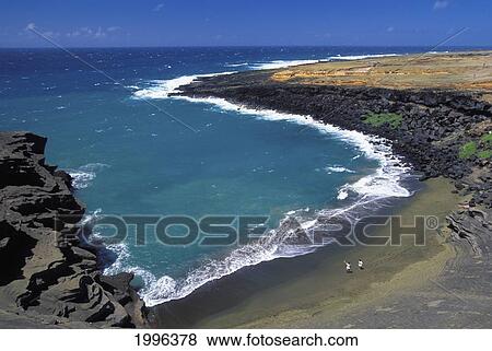 Stock Photo - Hawaii, Big Island, South Point, Green Sand Beach With Hikers On Sand. Fotosearch