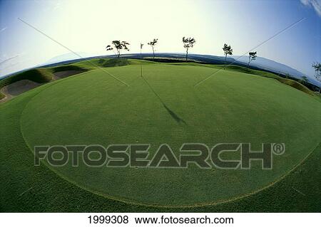 Stock Photo - Hawaii, Big Island, Waikoloa Golf Club Kings Course, Wide Angle Hole With Flag B1276. Fotosearch