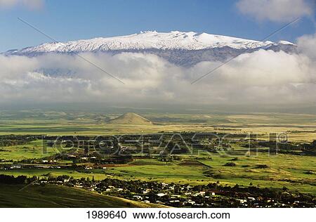 Stock Image - Hawaii, Big Island, Waimea Town And Snowcapped Mauna Kea. Fotosearch