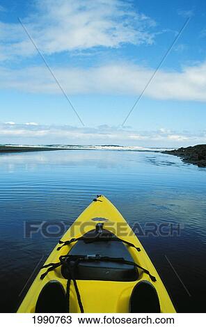 Stock Image - Hawaii, Big Island, Waipio Valley, Kayaking Downstream. Fotosearch