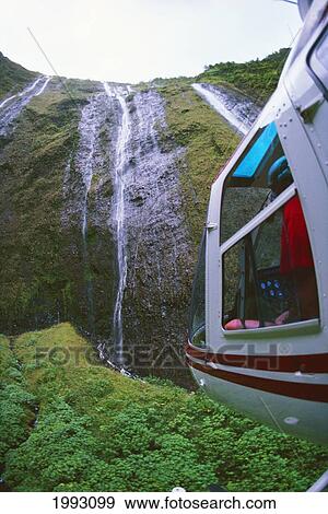 Hawaii, Big Island, Waterfall In Waipio Valley, Closeup Of Helicopter. View Large Photo Image Stock Photo - Hawaii, Big Island, Waterfall In Waipio Valley, Closeup Of Helicopter.. Fotosearch