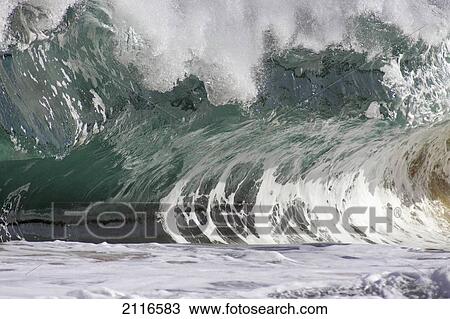 Stock Image - Hawaii, Big powerful wave break.. Fotosearch