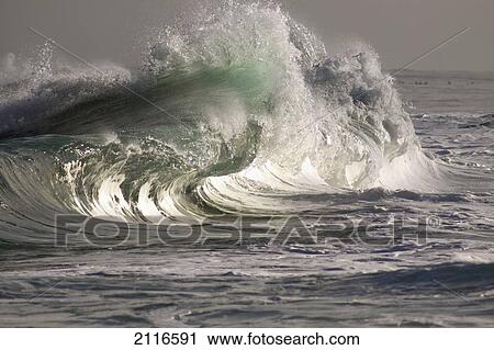Stock Image - Hawaii, Big powerful wave break.. Fotosearch