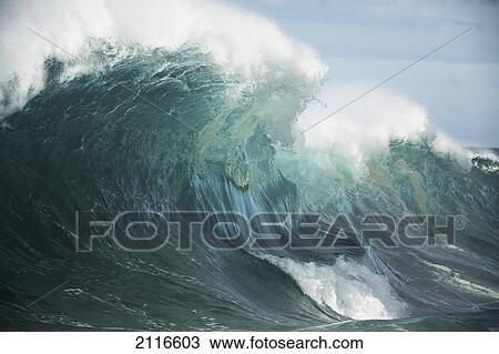 Stock Image - Hawaii, Big powerful wave break.. Fotosearch