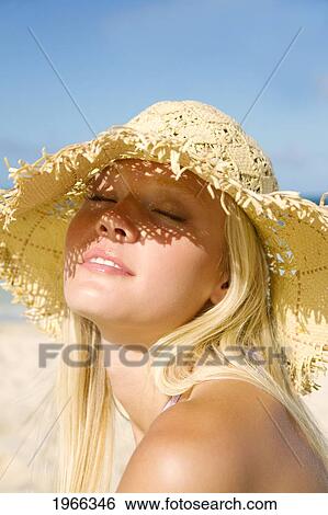 Hawaii, Blond Woman Enjoying A Bright Sunny Day At The Beach. View Large Photo Image Stock Photograph - Hawaii, Blond Woman Enjoying A Bright Sunny Day At The Beach.. Fotosearch