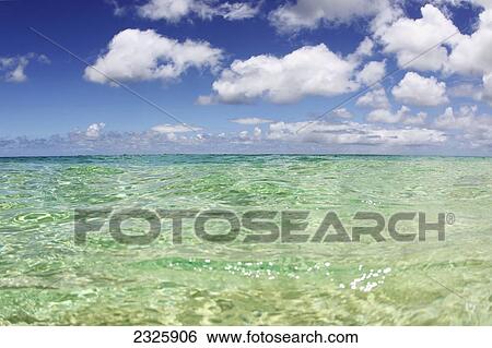 Hawaii, Blue Sky And Clear Green Water Seascape. View Large Photo Image Stock Photograph - Hawaii, Blue Sky And Clear Green Water Seascape.. Fotosearch