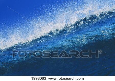 Hawaii, Bright Blue Wave At It's Peak With White Wash, Blue Sky. View Large Photo Image Stock Image - Hawaii, Bright Blue Wave At It's Peak With White Wash, Blue Sky.. Fotosearch
