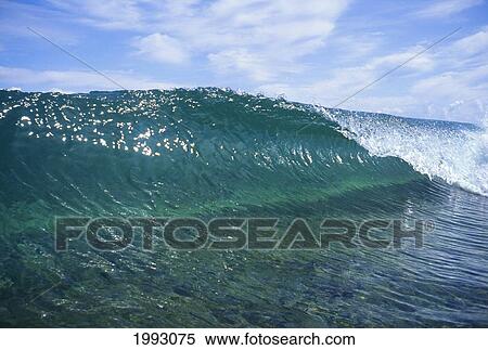 Stock Photography - Hawaii, Curling Wave Over Shallow Reef, Blue Sky With Clouds.. Fotosearch