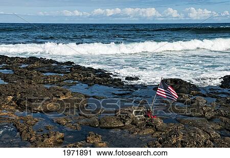 Stock Image - Hawaii, Friends And Family Leave Memorial For A Surfer That Passed Away.. Fotosearch
