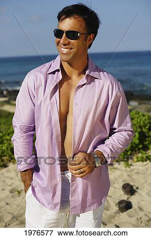 Hawaii, Handsome Man Posing On Beautiful Beach. View Large Photo Image Stock Photo - Hawaii, Handsome Man Posing On Beautiful Beach.. Fotosearch