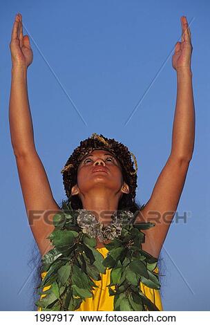 Stock Photo - Hawaii, Hawaiian Maiden Maile Leis Arms Raised. Fotosearch