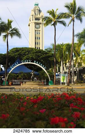 Stock Photography - Hawaii, Honolulu, Aloha tower and the Boat Days Bazaar.. Fotosearch