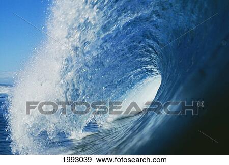 Stock Photo - Hawaii, Inside Curling Blue Wave. Fotosearch