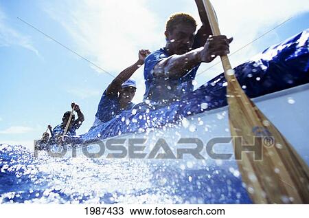 Hawaii, Kaiwi Channel, Molokai To Oahu, Close-Up Of Male Paddlers During Molokai Hoe Race. No Model Release View Large Photo Image Stock Image - Hawaii, Kaiwi Channel, Molokai To Oahu, Close-Up Of Male Paddlers During Molokai Hoe Race. No Model Release. Fotosearch