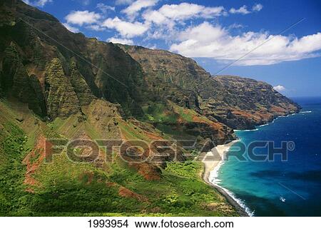 Picture - Hawaii, Kauai, Aerial Along Napali Coastline, Rugged Cliffs. Fotosearch