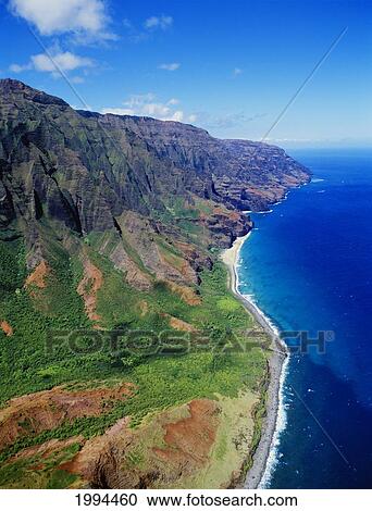 Stock Image - Hawaii, Kauai, Aerial Along Napali Coastline With Amazing Ridges, Remote Beaches. Fotosearch