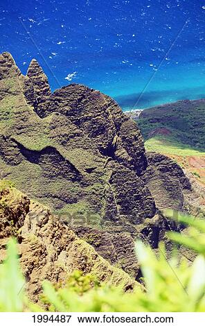 Hawaii, Kauai, Aerial Along Napali Coastline With Eroded Jagged Cliffs, Lookout To Ocean View Large Photo Image Stock Photo - Hawaii, Kauai, Aerial Along Napali Coastline With Eroded Jagged Cliffs, Lookout To Ocean. Fotosearch