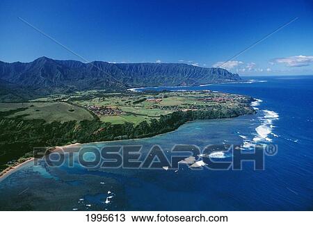 Stock Image - Hawaii, Kauai, Aerial Of Hanalei Bay And Princeville Resort.. Fotosearch