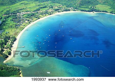 Stock Photo - Hawaii, Kauai, Aerial Of Hanalei Bay, Boats In Ocean. Fotosearch