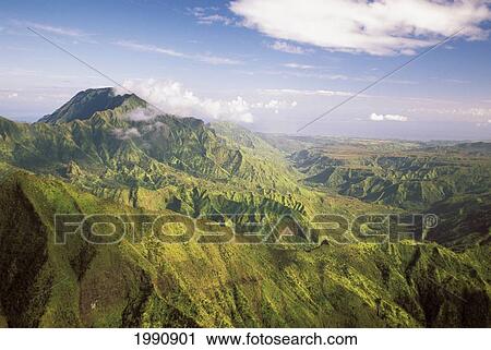 Stock Image - Hawaii, Kauai, Aerial Scenic Of Lush Mountains, Valleys, Ridges, Plateaus.. Fotosearch