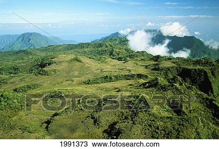 Stock Image - Hawaii, Kauai, Aerial Scenic Of Lush Mountains, Valleys, Ridges, Plateaus.. Fotosearch