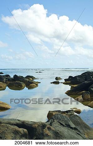 Stock Image - Hawaii, Kauai, Anahola, Shark's Hei'au Along Ocean.. Fotosearch