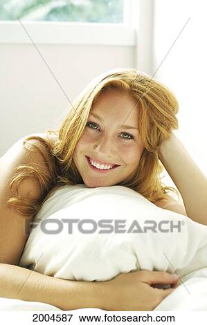 Hawaii, Kauai, Attractive Young Redheaded Woman Models In Bed. View Large Photo Image Stock Photo - Hawaii, Kauai, Attractive Young Redheaded Woman Models In Bed.. Fotosearch