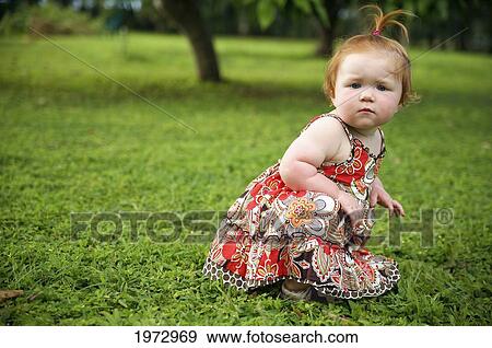 Hawaii, Kauai, Baby Girl Playing In A Park. View Large Photo Image Stock Photo - Hawaii, Kauai, Baby Girl Playing In A Park.. Fotosearch