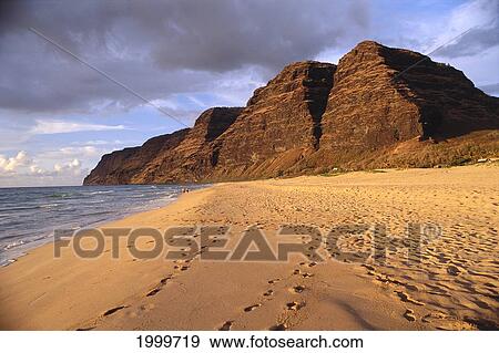 Hawaii, Kauai, Golden Sunset Lighting Over Polihale Beach State Park, Couple In Distance View Large Photo Image Stock Photo - Hawaii, Kauai, Golden Sunset Lighting Over Polihale Beach State Park, Couple In Distance. Fotosearch