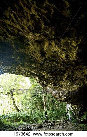 Stock Image - Hawaii, Kauai, Haena Falls, Inside Of Haena Cave.. Fotosearch