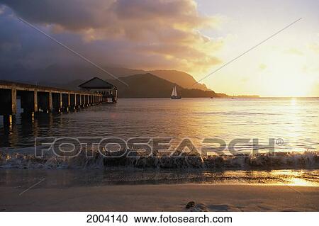 Hawaii, Kauai, Hanalei Bay And Pier At Sunset, Golden Reflections, View From Shoreline View Large Photo Image Stock Image - Hawaii, Kauai, Hanalei Bay And Pier At Sunset, Golden Reflections, View From Shoreline. Fotosearch