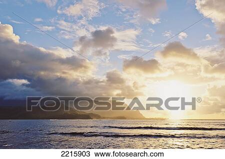 Hawaii, Kauai, Hanalei Bay, Dramatic sunset over ocean. View Large Photo Image Stock Image - Hawaii, Kauai, Hanalei Bay, Dramatic sunset over ocean.. Fotosearch