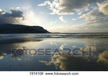 Stock Photo - Hawaii, Kauai, Hanalei Bay, Sunset With Beautiful Reflections.. Fotosearch