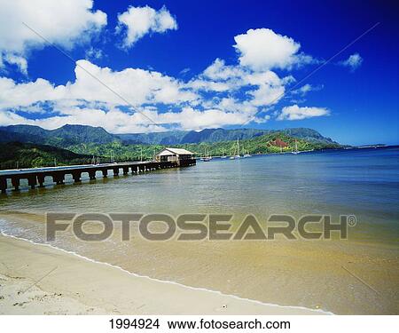 Hawaii, Kauai, Hanalei Bay With Pier Walkway, Sailboats Anchored In Background View Large Photo Image Picture - Hawaii, Kauai, Hanalei Bay With Pier Walkway, Sailboats Anchored In Background. Fotosearch