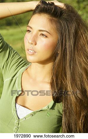 Hawaii, Kauai, Hanalei, Beautiful Fashion Model 0N A Grassy Field. View Large Photo Image Stock Image - Hawaii, Kauai, Hanalei, Beautiful Fashion Model 0N A Grassy Field.. Fotosearch