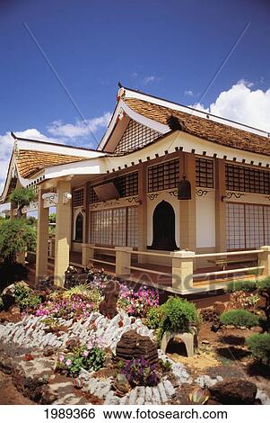 Stock Photograph - Hawaii, Kauai, Hanapepe, Soto Zen Temple Zensuji Exterior With Flower Garden.. Fotosearch