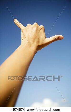Hawaii, Kauai, Hand Gestures At The Beach (Shaka). View Large Photo Image Picture - Hawaii, Kauai, Hand Gestures At The Beach (Shaka).. Fotosearch