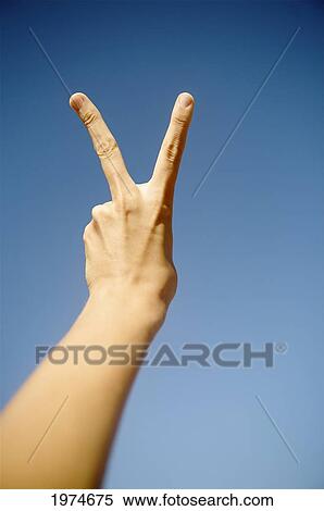 Hawaii, Kauai, Hand Gestures At The Beach (Peace). View Large Photo Image Stock Photography - Hawaii, Kauai, Hand Gestures At The Beach (Peace).. Fotosearch