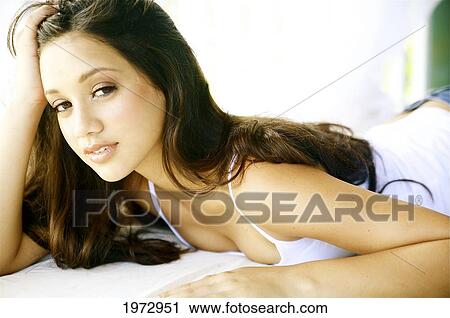 Stock Image - Hawaii, Kauai, Headshot Of Attractive Young Woman.. Fotosearch