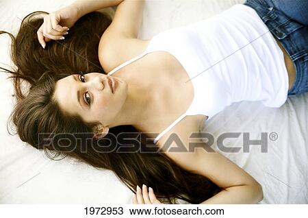 Stock Image - Hawaii, Kauai, Headshot Of Attractive Young Woman.. Fotosearch