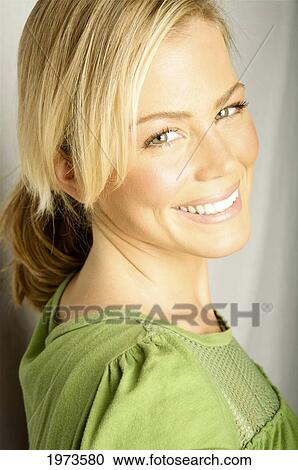 Stock Image - Hawaii, Kauai, Headshot Of Attractive Young Woman.. Fotosearch