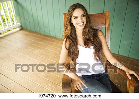 Stock Image - Hawaii, Kauai, Headshot Of Attractive Young Woman.. Fotosearch