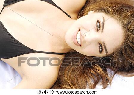 Stock Photo - Hawaii, Kauai, Headshot Of Attractive Young Woman.. Fotosearch