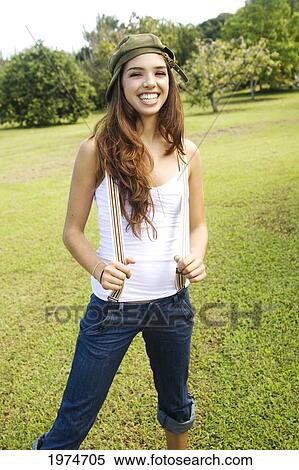 Stock Photography - Hawaii, Kauai, Headshot Of Attractive Young Woman.. Fotosearch