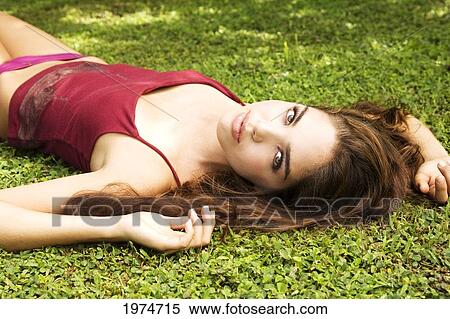 Stock Photography - Hawaii, Kauai, Headshot Of Attractive Young Woman.. Fotosearch