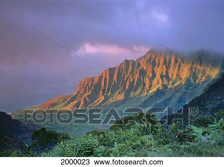 Hawaii, Kauai, Kalalau Valley With Cloud Cover, Pink Hues, Ocean Visible C1548 View Large Photo Image Stock Image - Hawaii, Kauai, Kalalau Valley With Cloud Cover, Pink Hues, Ocean Visible C1548. Fotosearch